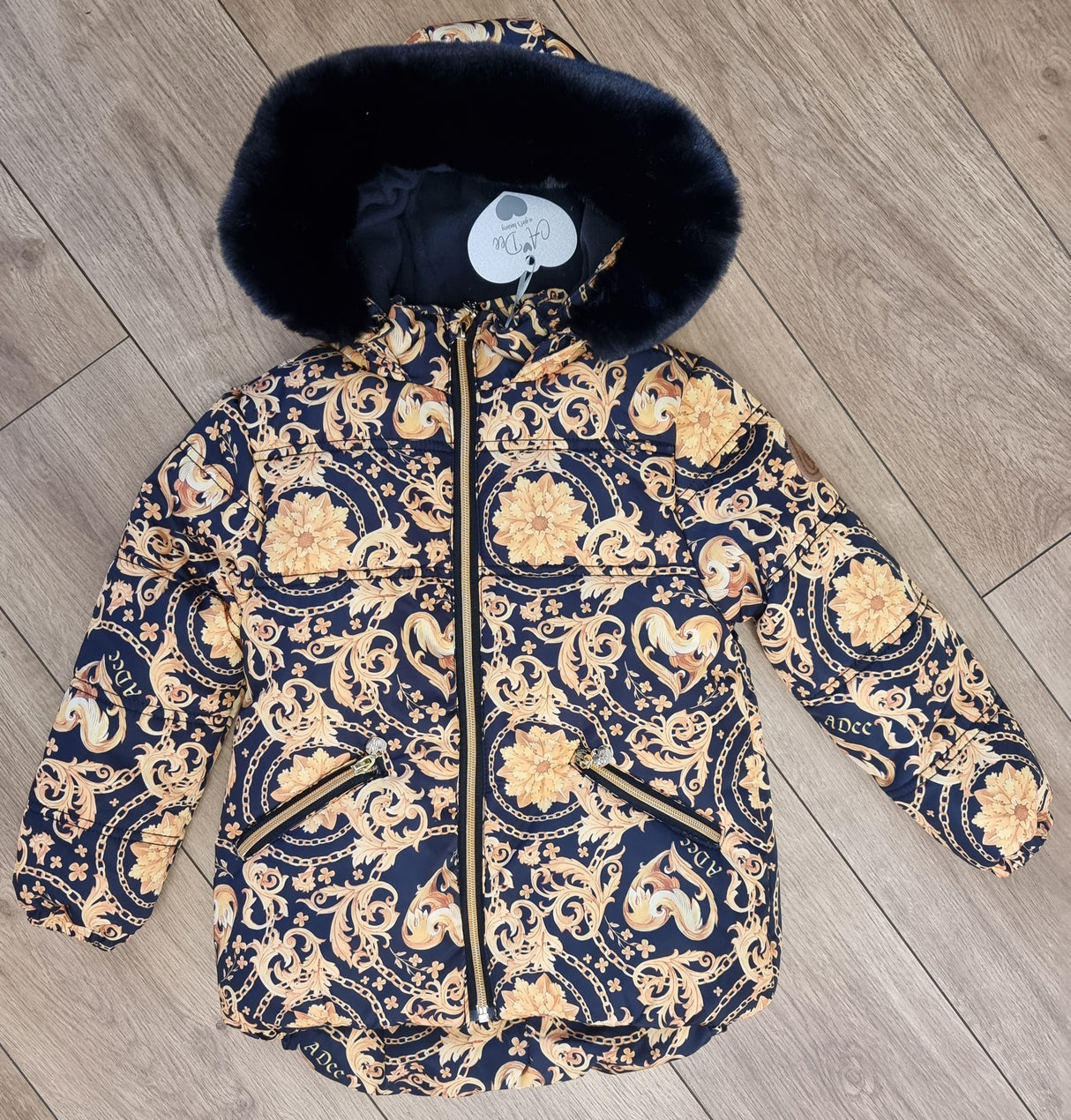A Dee 5 Year SAMPLE Black & Gold Printed Coat